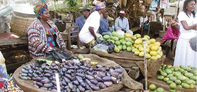 Global trade regimes and local opportunities are closely linked. Here, women in Mfoundi Market, Yaoundé, Cameroon, sell their agricultural produce. (Source: P. Nyemeck/CIFOR)