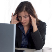 Upset Woman at Laptop