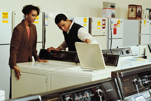 person looking at washing machine