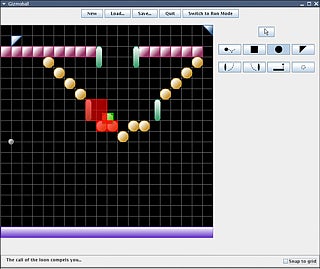 Gizmoball game in progress, with colored elements on a black background.