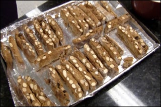 Long thin cookies with nuts.