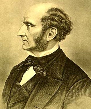 A balding, middle-aged white man with wavy hair, and thick sideburns.