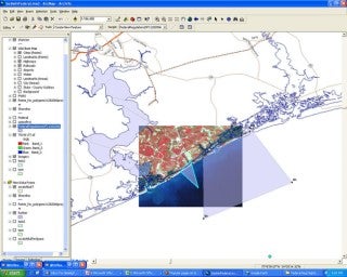 A map of a coastline and nearby estuaries, with an inset rectangle displaying a satellite image of the area.