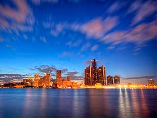 A photo of Detroit, Michigan, taken at sunset from the river.