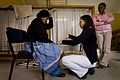 Erin Kresenthal, an Australian Volunteer who is working as an Occupational Therapy Adviser talks to a patient about their therapay at the Cheshire Homes in Matsapa, Swaziland on the 10th June, 2009..jpg