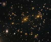 Gravitational lensing in the galaxy cluster Abell 370 (captured by the Hubble Space Telescope).jpg